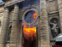Vandals, arsonists target French Catholic churches